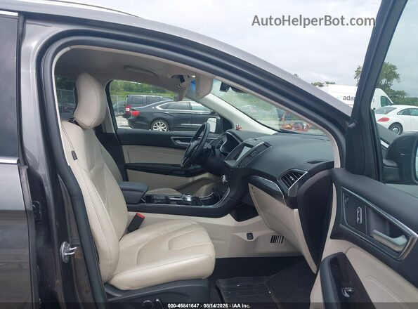 2FMPK4K94KBB01504 2019 FORD EDGE Gray Vista interior delantera