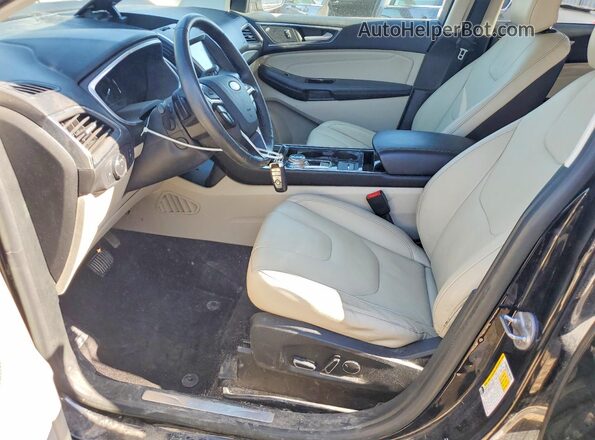 2FMPK4K94KBB76722 2019 FORD EDGE Черный Вид салона спереди
