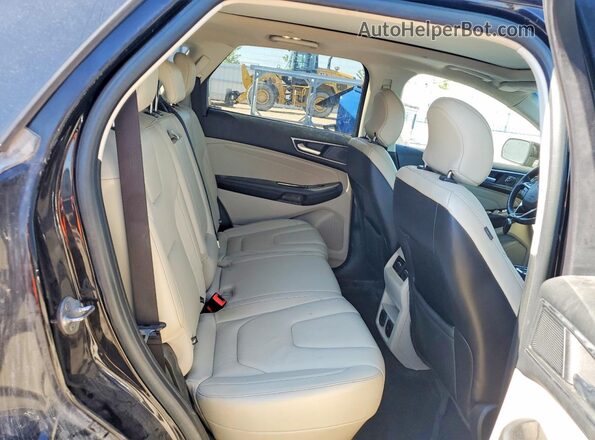 2FMPK4K94KBB76722 2019 FORD EDGE Черный Вид задней части салона