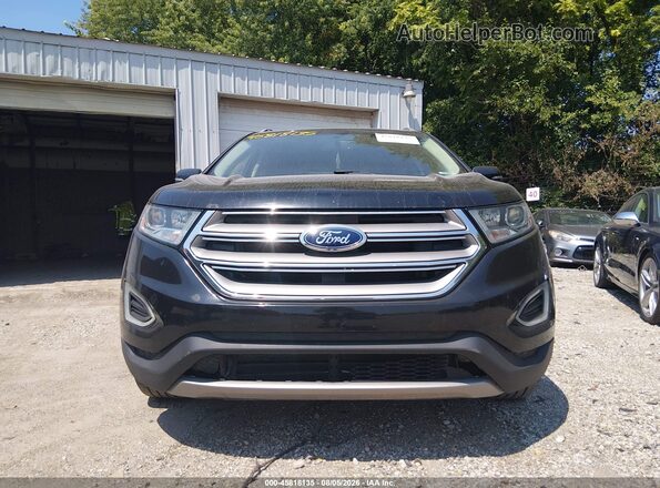 2FMPK4K95HBB76284 2017 FORD EDGE Black Widok z przodu