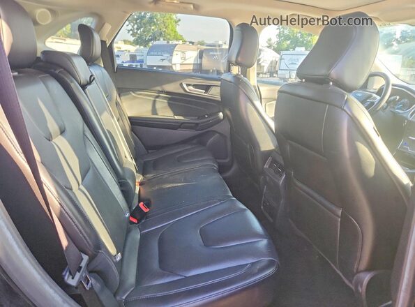 2FMPK4K95LBB53242 2020 FORD EDGE Black Vista interior trasera