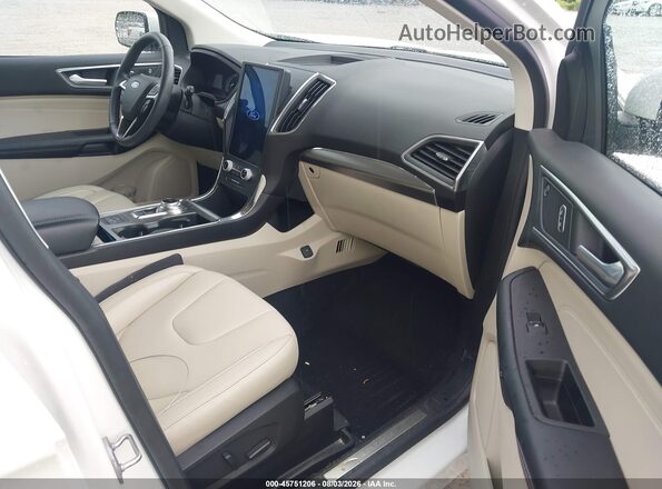 2FMPK4K95NBB00057 2022 FORD EDGE White Vista interior delantera