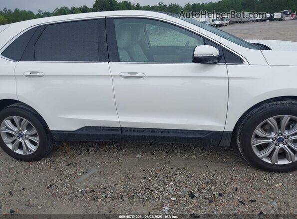 2FMPK4K95NBB00057 2022 FORD EDGE White Vista interior trasera