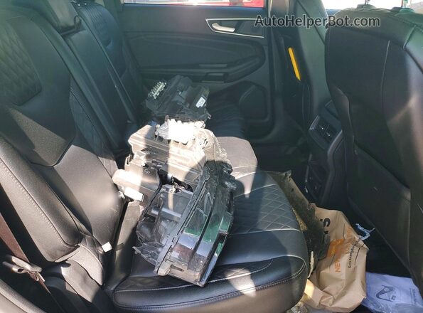 2FMPK4K95RBA93357 2024 FORD EDGE Silver Widok wnętrza z tyłu