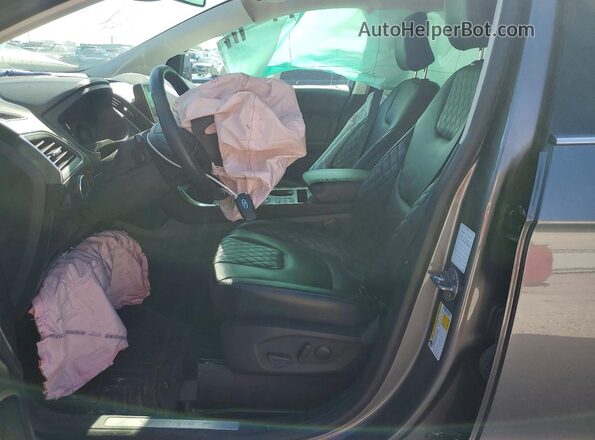 2FMPK4K95RBA93357 2024 FORD EDGE Silver Widok wnętrza z przodu