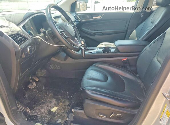 2FMPK4K97JBB75952 2018 FORD EDGE Серебряный Вид салона спереди