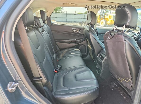 2FMPK4K98GBC57004 2016 FORD EDGE Blue Вид задньої частини салону