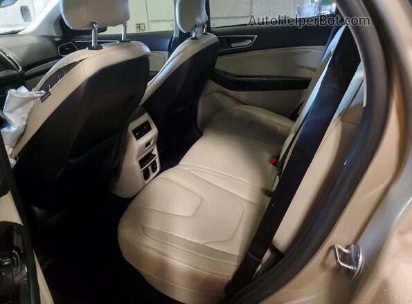 2FMPK4K9XHBB98944 2017 FORD EDGE Tan Vista interior trasera