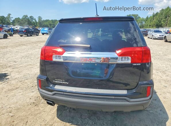 2GKALMEKXH6115726 2017 GMC TERRAIN Black Front interior view