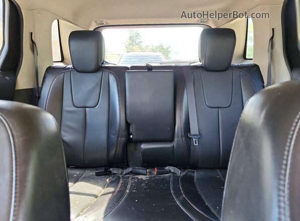 2GKFLUE30G6185037 2016 GMC TERRAIN Black Vista de los asientos traseros