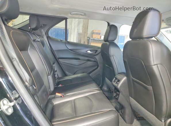 2GNAXWEX5J6266705 2018 CHEVROLET EQUINOX Black Rear interior view