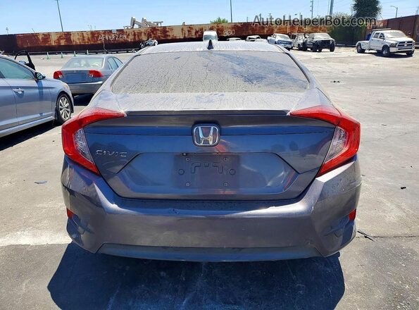 2HGFC1F31HH655477 2017 HONDA CIVIC Silver Rear view