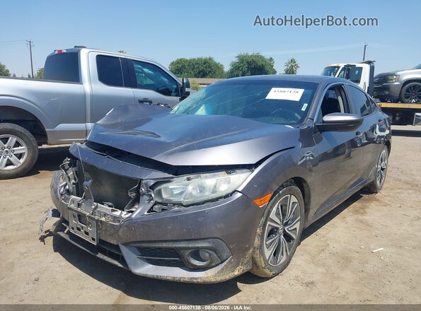 2HGFC1F33GH645757 2016 HONDA CIVIC Gray Vista tres cuartos delantera izquierda
