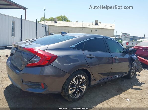 2HGFC1F33GH645757 2016 HONDA CIVIC Gray Vista interior trasera
