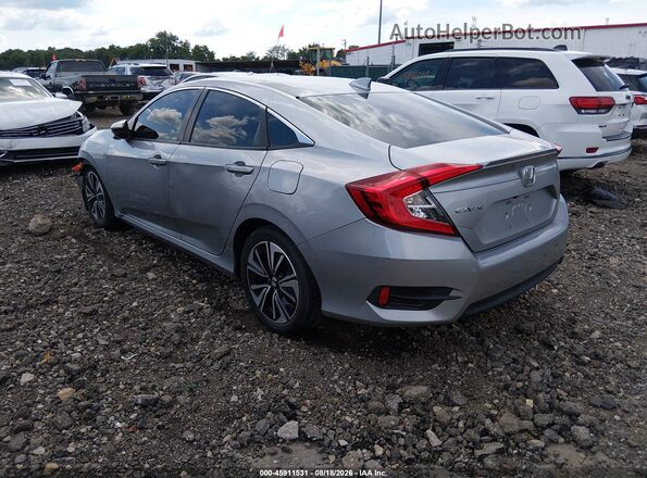 2HGFC1F34JH645998 2018 HONDA CIVIC Silver Trasero izquierdo