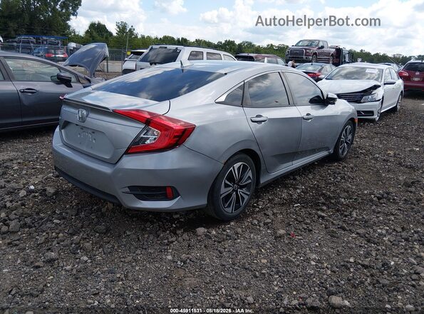 2HGFC1F34JH645998 2018 HONDA CIVIC Silver Trasero derecho