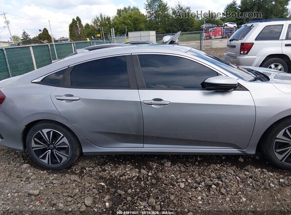 2HGFC1F34JH645998 2018 HONDA CIVIC Silver Vista interior trasera