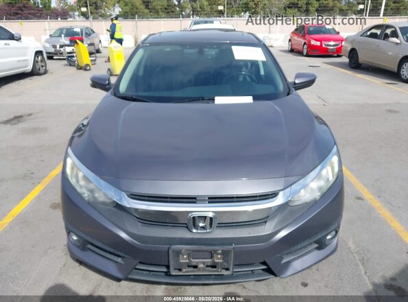 2HGFC1F70HH644926 2017 HONDA CIVIC Серый Вид задней части салона