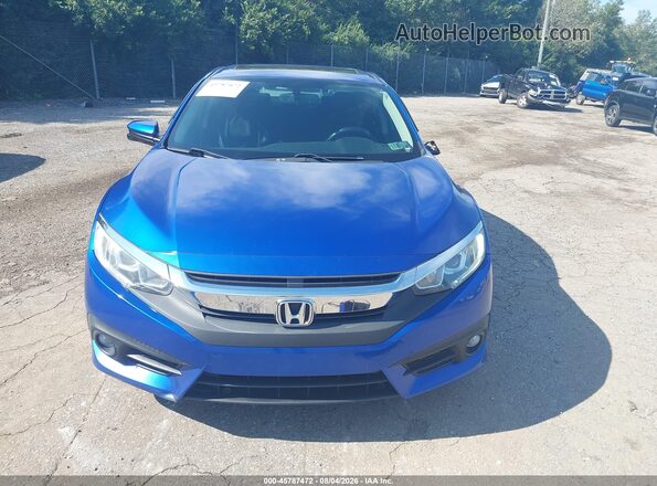 2HGFC1F79HH641328 2017 HONDA CIVIC Синий Вид задней части салона
