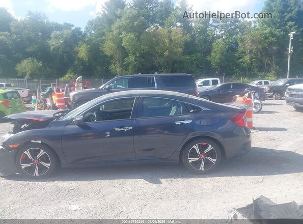 2HGFC1F90HH653806 2017 HONDA CIVIC Blue Rear interior view