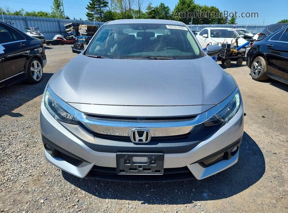 2HGFC1F90JH102751 2018 HONDA CIVIC Серебряный Вид спереди