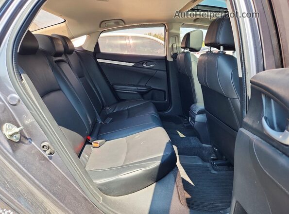 2HGFC1F95HH100570 2017 HONDA CIVIC Gray Rear seats view