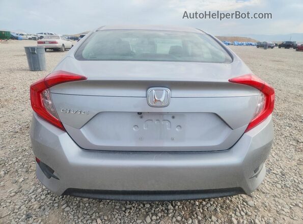 2HGFC2F50HH511006 2017 HONDA CIVIC Silver Rear view