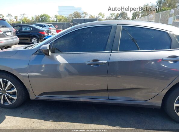 2HGFC2F50HH561632 2017 HONDA CIVIC Gray Rear interior view