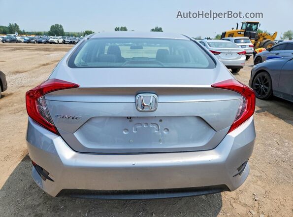 2HGFC2F50JH034809 2018 HONDA CIVIC Silver Rear view