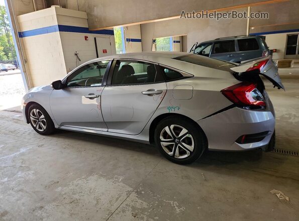 2HGFC2F51HH575118 2017 HONDA CIVIC Silver Trasero izquierdo