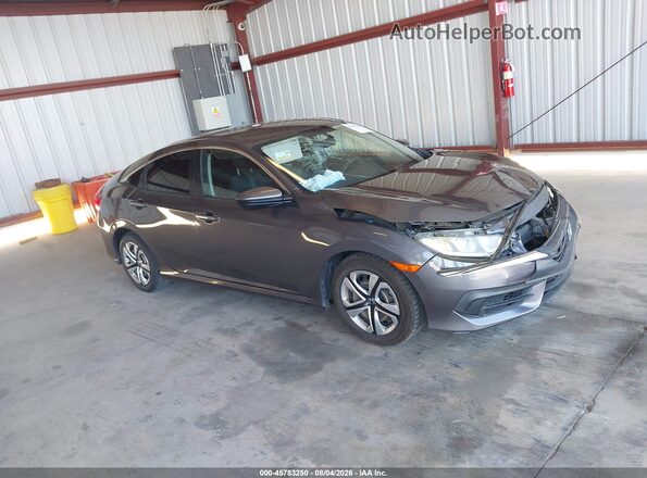2HGFC2F54JH541504 2018 HONDA CIVIC Silver Widok wnętrza z tyłu