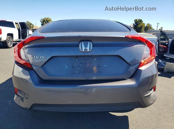 2HGFC2F56GH571371 2016 HONDA CIVIC Gray Rear view