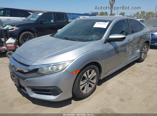 2HGFC2F58GH576894 2016 HONDA CIVIC Gray Առջևի ձախ երեք քառորդ տեսարան