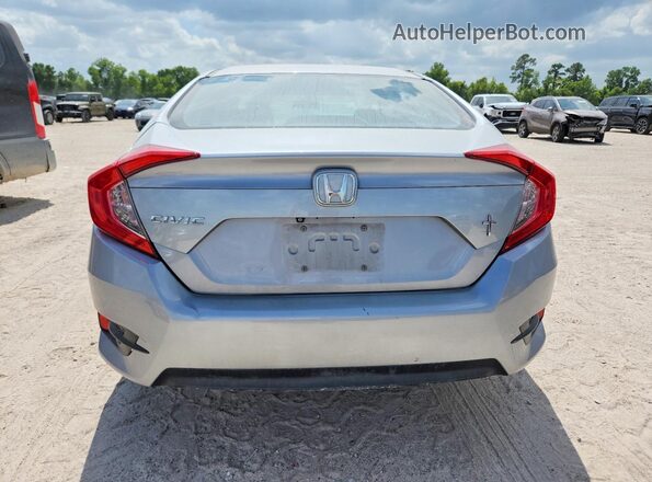 2HGFC2F58JH564557 2018 HONDA CIVIC Серебряный Вид сзади