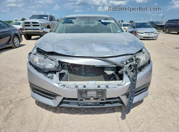 2HGFC2F58JH564557 2018 HONDA CIVIC Серебряный Вид спереди