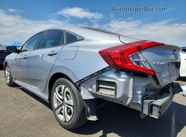 2HGFC2F59JH542695 2018 HONDA CIVIC Silver Trasero izquierdo