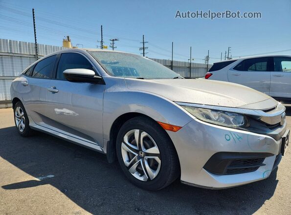 2HGFC2F59JH542695 2018 HONDA CIVIC Silver Delantero derecho