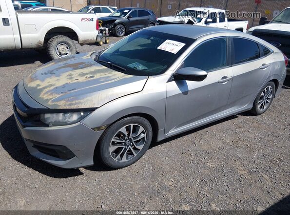 2HGFC2F59JH550487 2018 HONDA CIVIC Silver Vista tres cuartos delantera izquierda