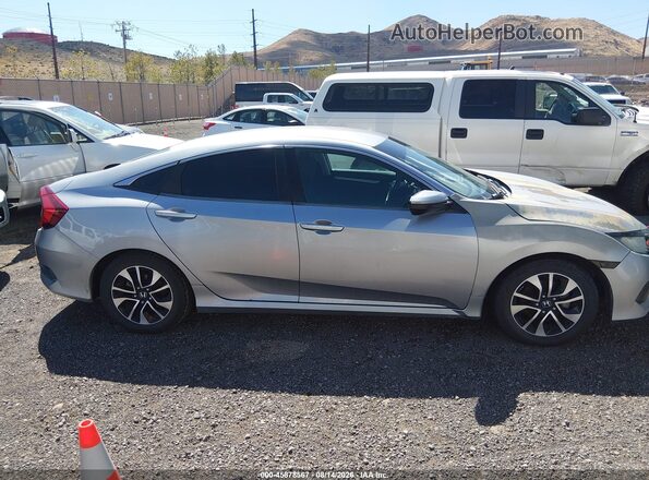 2HGFC2F59JH550487 2018 HONDA CIVIC Silver Vista interior trasera