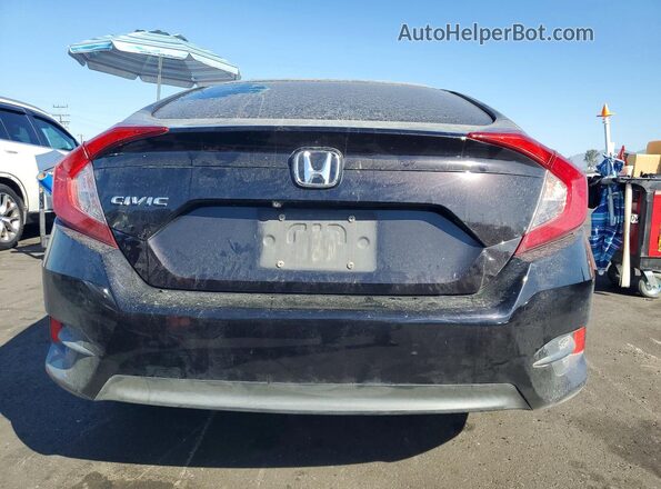 2HGFC2F59JH560114 2018 HONDA CIVIC Black Rear view