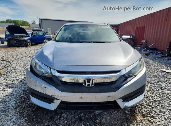 2HGFC2F59JH566723 2018 HONDA CIVIC Серебряный Вид спереди