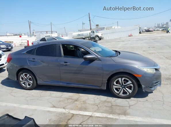 2HGFC2F5XGH551334 2016 HONDA CIVIC Серый Вид задней части салона