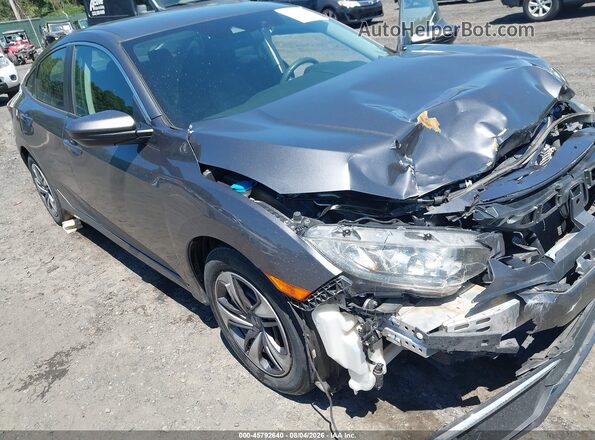 2HGFC2F64KH584590 2019 HONDA CIVIC Gray 
