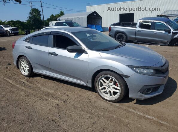 2HGFC2F66JH039182 2018 HONDA CIVIC Silver Front right
