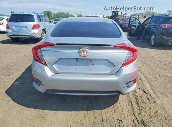 2HGFC2F66JH039182 2018 HONDA CIVIC Silver Rear view