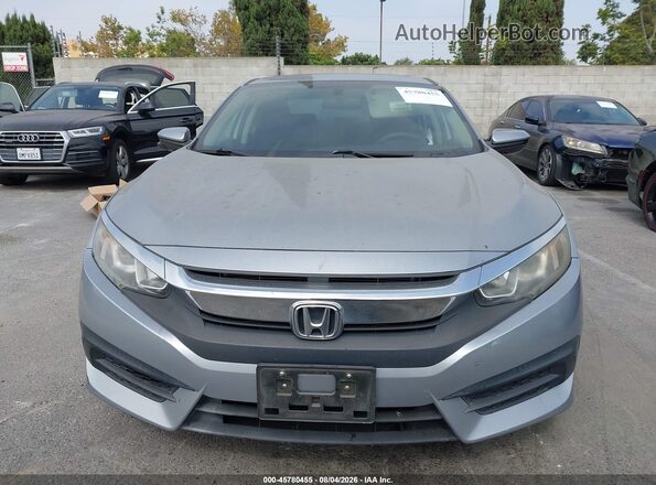 2HGFC2F73HH558774 2017 HONDA CIVIC Серебряный Вид задней части салона