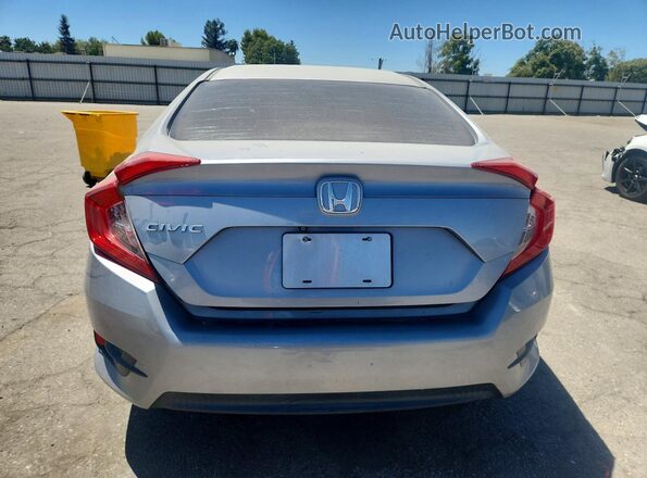 2HGFC2F74GH513048 2016 HONDA CIVIC Silver Հետևի տեսք