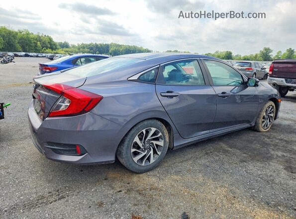 2HGFC2F74GH519142 2016 HONDA CIVIC Серый Вид сзади