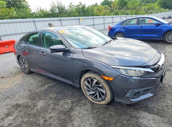 2HGFC2F74GH519142 2016 HONDA CIVIC Серый Вид салона спереди