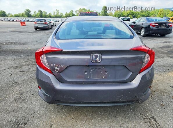 2HGFC2F74GH519142 2016 HONDA CIVIC Серый Вид задней части салона